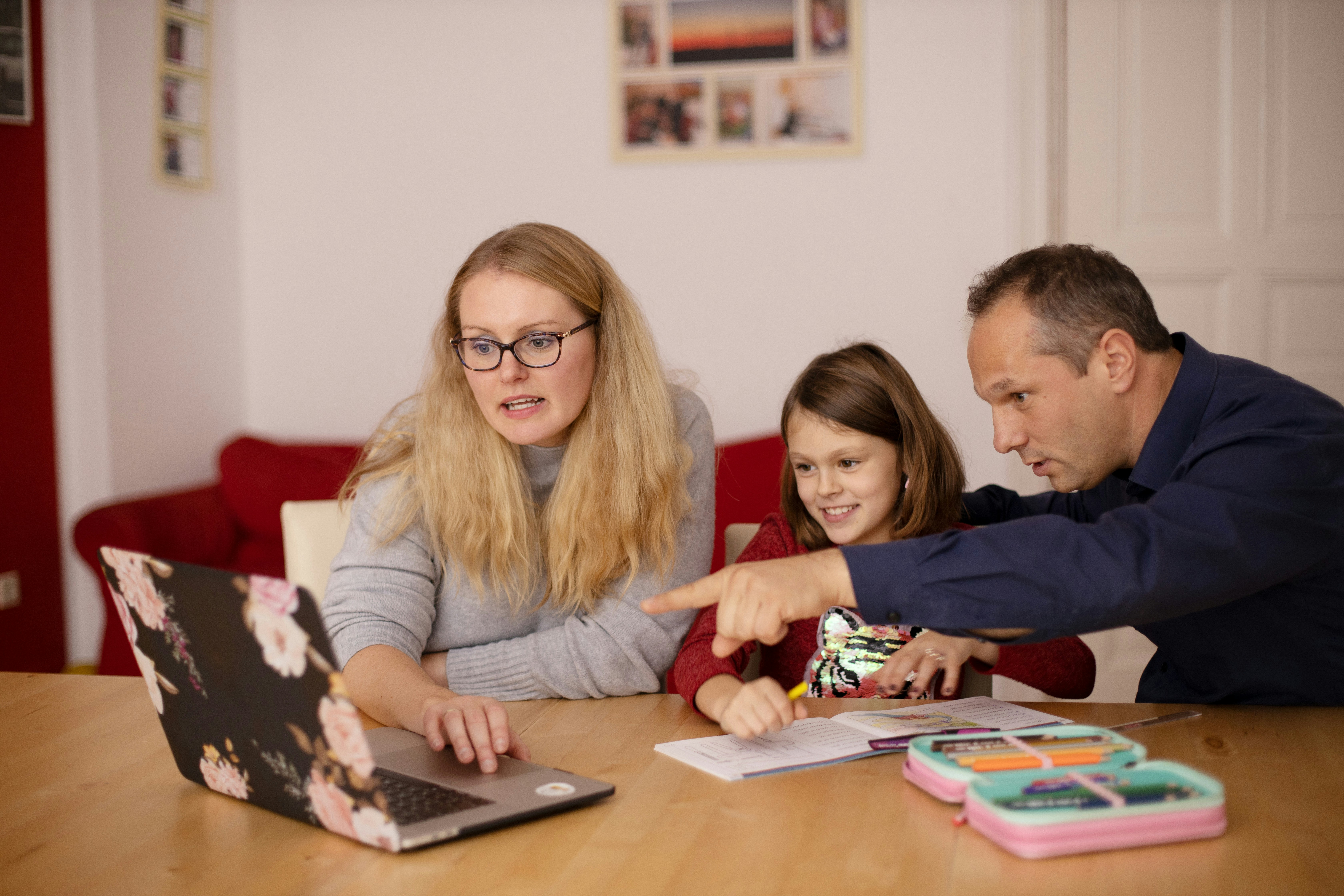Mother helping child learn